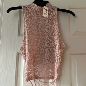 Express brand never worn women’s pale pink lace top